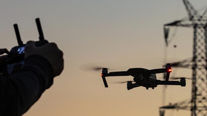 Photo of Don't Mind the Drones...They're Just Here Checking the 'Power Lines'